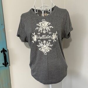 Hollister Charcoal Gray Tee with White embroidered Floral Logo